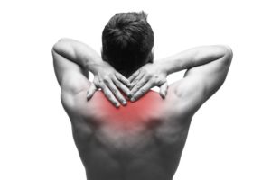 Man with upper back pain and neck pain.